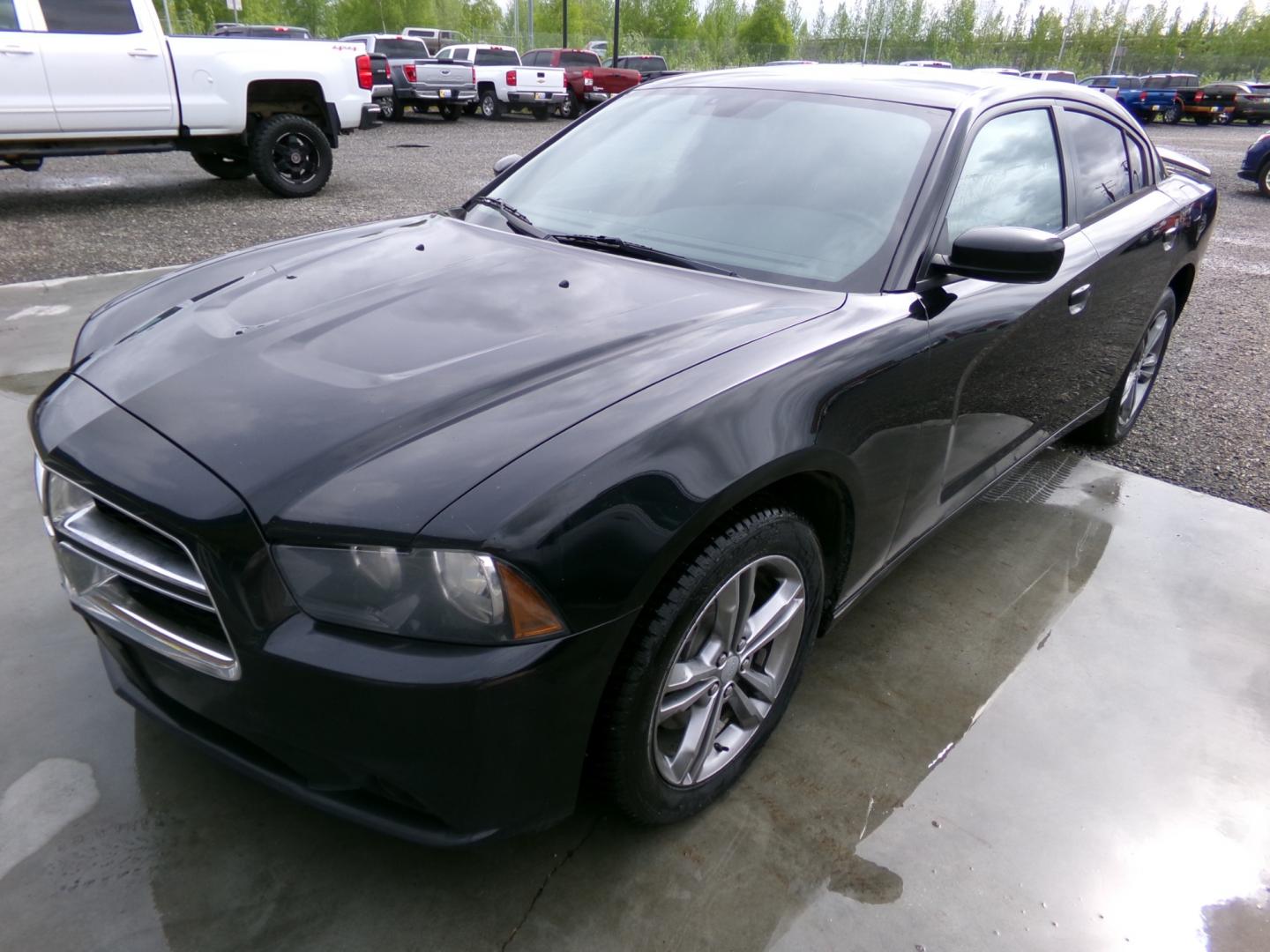 2014 Black Dodge Charger (2C3CDXJG7EH) , located at 2630 Philips Field Rd., Fairbanks, AK, 99709, (907) 458-0593, 64.848068, -147.780609 - Photo#0
